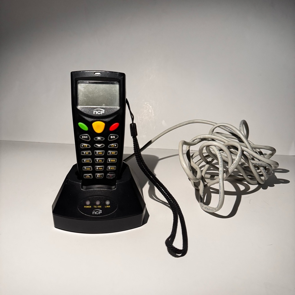NCR Black Handheld Device with Charging Dock